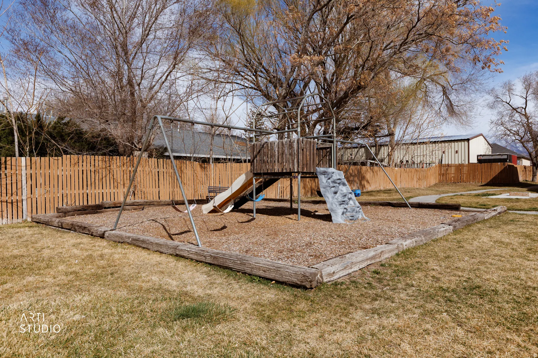 View of playground featuring a fenced backyard