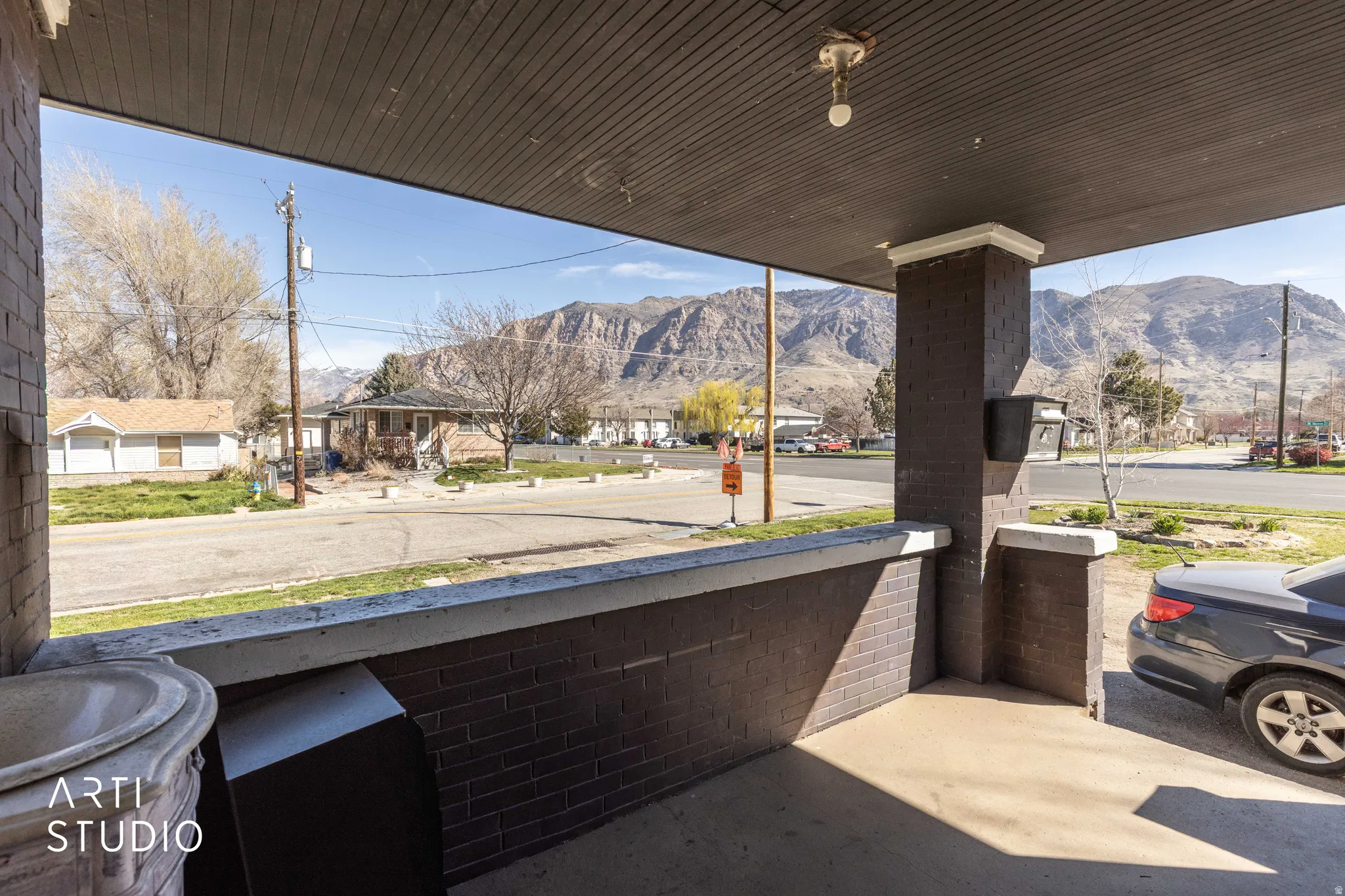 Porch featuring a mountain view