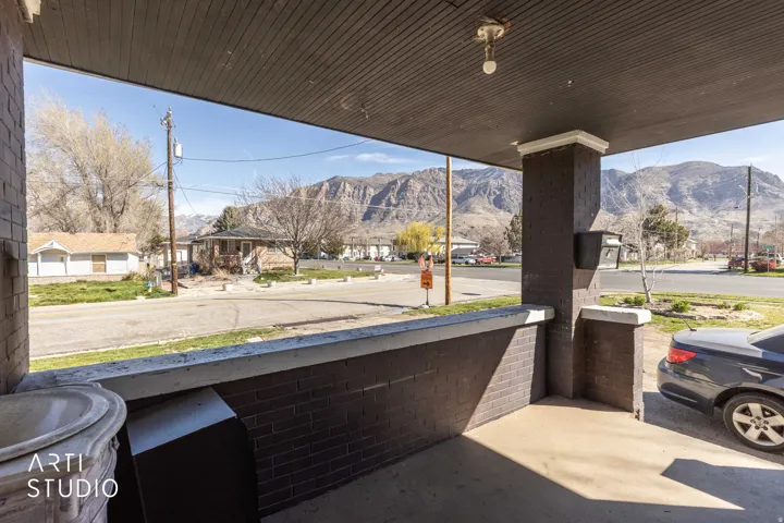 Porch featuring a mountain view