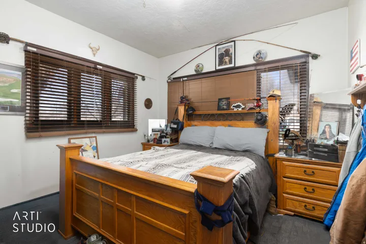 Bedroom with a textured ceiling