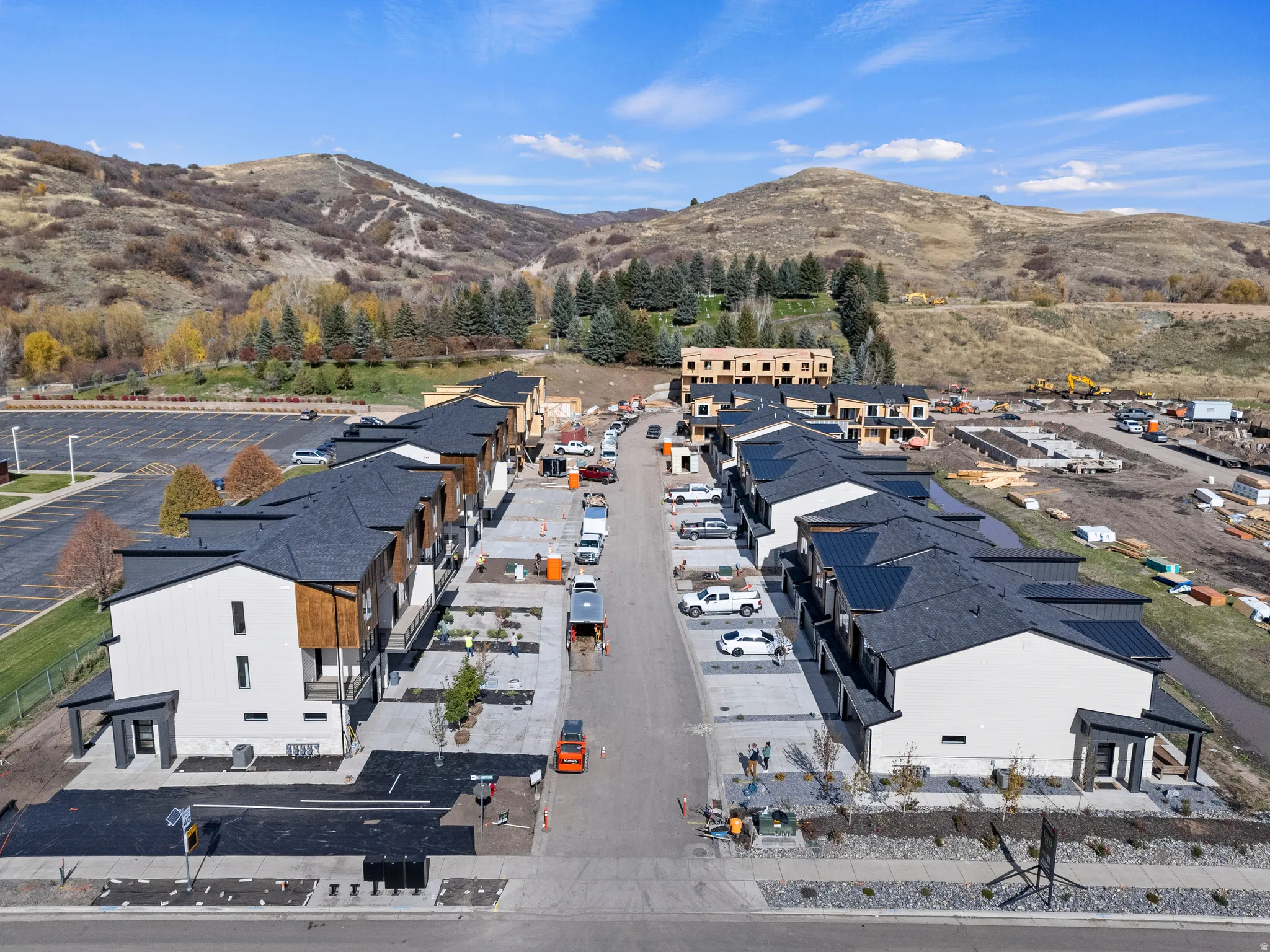 Aerial perspective of suburban area with a mountain backdrop