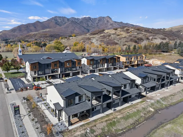 Aerial view of residential area featuring mountains