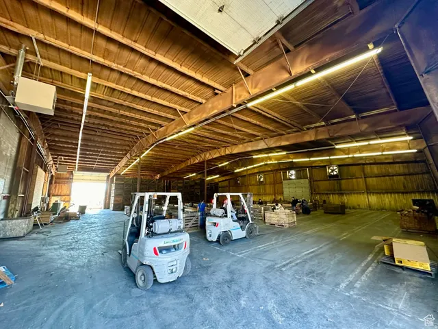 Garage featuring a heating unit