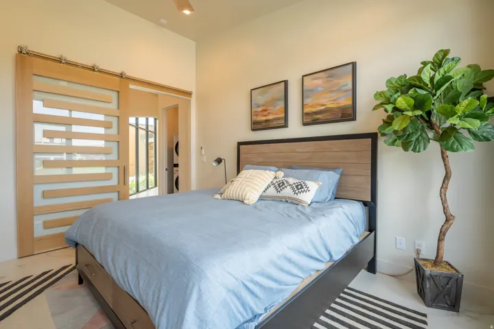 Bedroom featuring a barn door