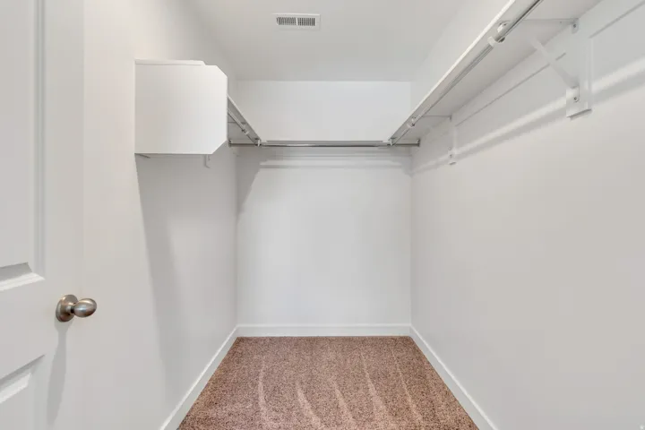 Extra large walk in closet in the generously sized second bedroom. Great storage!