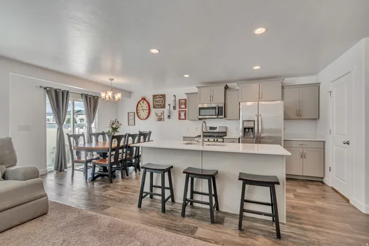 This kitchen has great seating at the bar, and can even fit a large table!