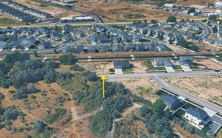View of property location featuring nearby suburban area and property boundaries highlighted