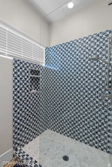 Full bath with a shower stall