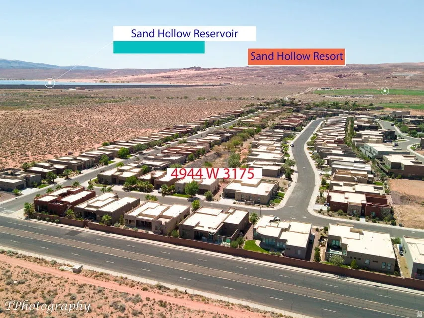 Aerial view of residential area with a mountain backdrop