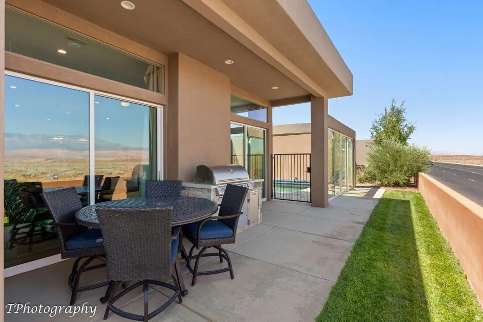 View of patio / terrace featuring an outdoor kitchen / dining area