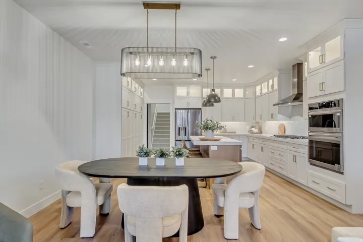 Dining room featuring light wood-style flooring and recessed lighting