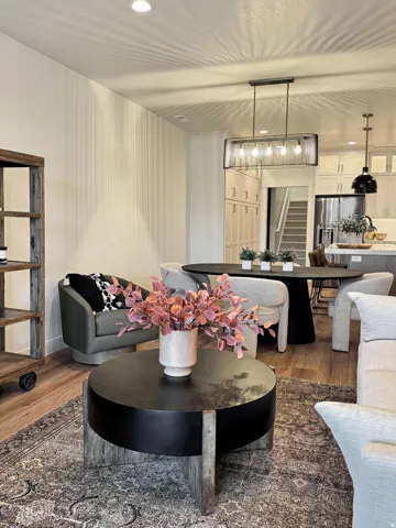 Living room featuring dark wood finished floors and recessed lighting