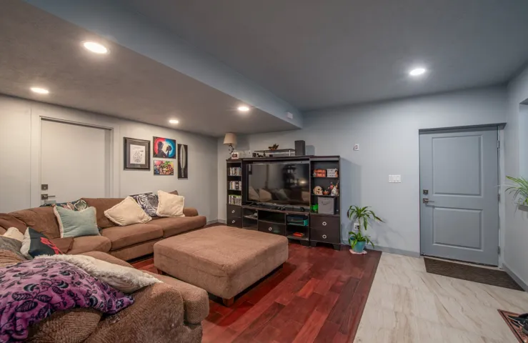Living area featuring recessed lighting and wood finished floors