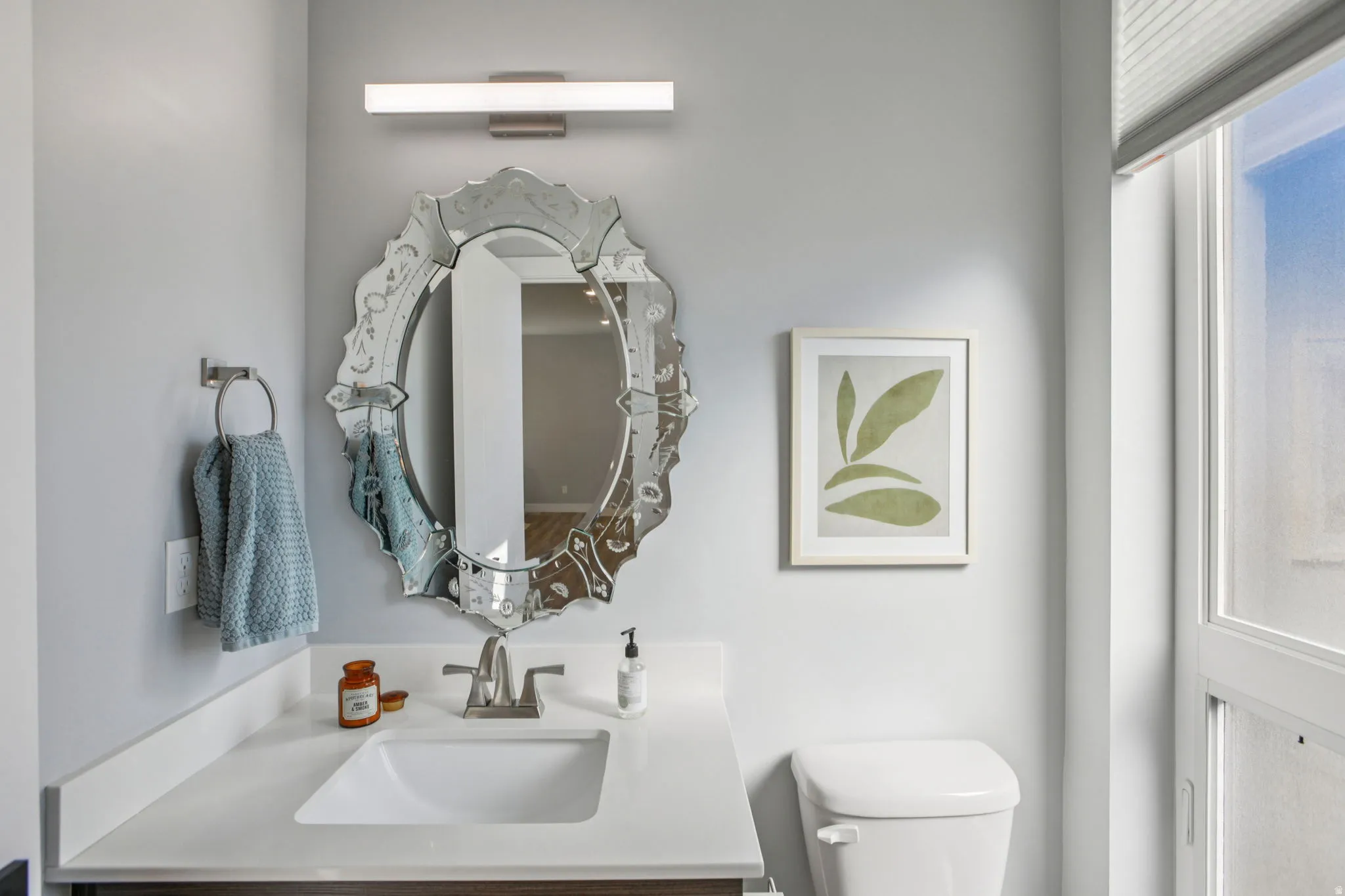 Bathroom featuring toilet and vanity