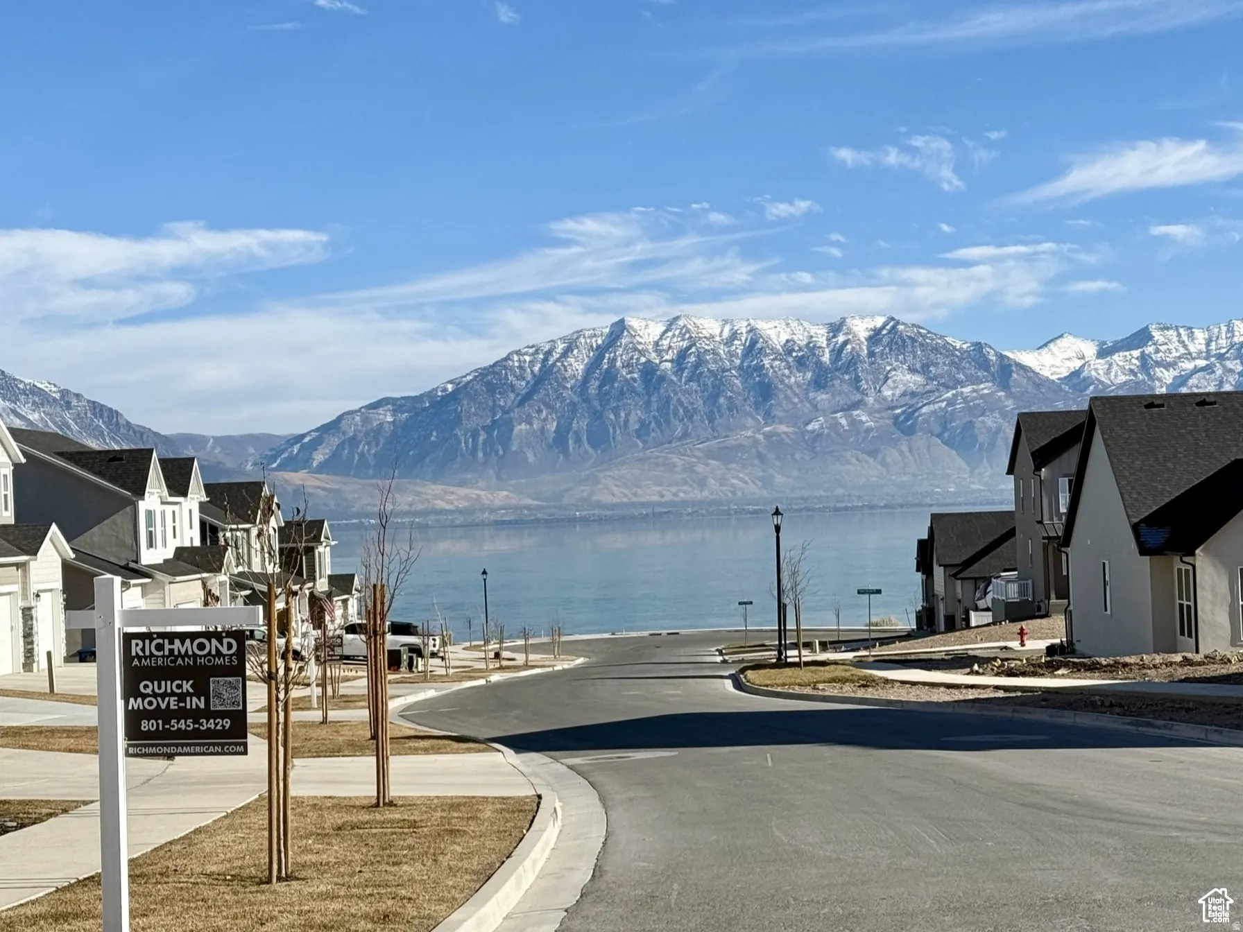 Water view with mountains and nearby suburban area