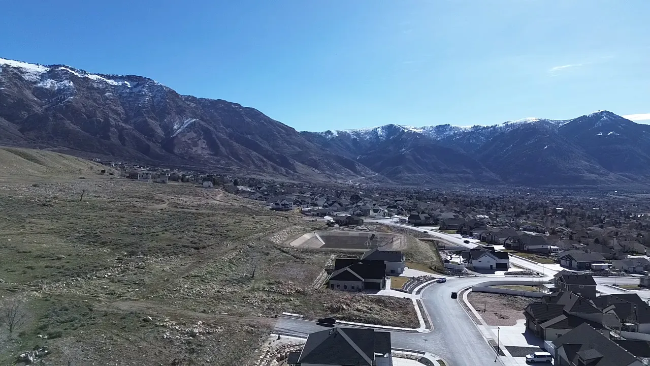 Mountain view featuring nearby suburban area