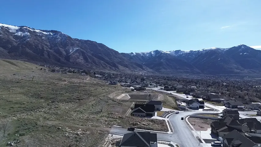 Mountain view featuring nearby suburban area