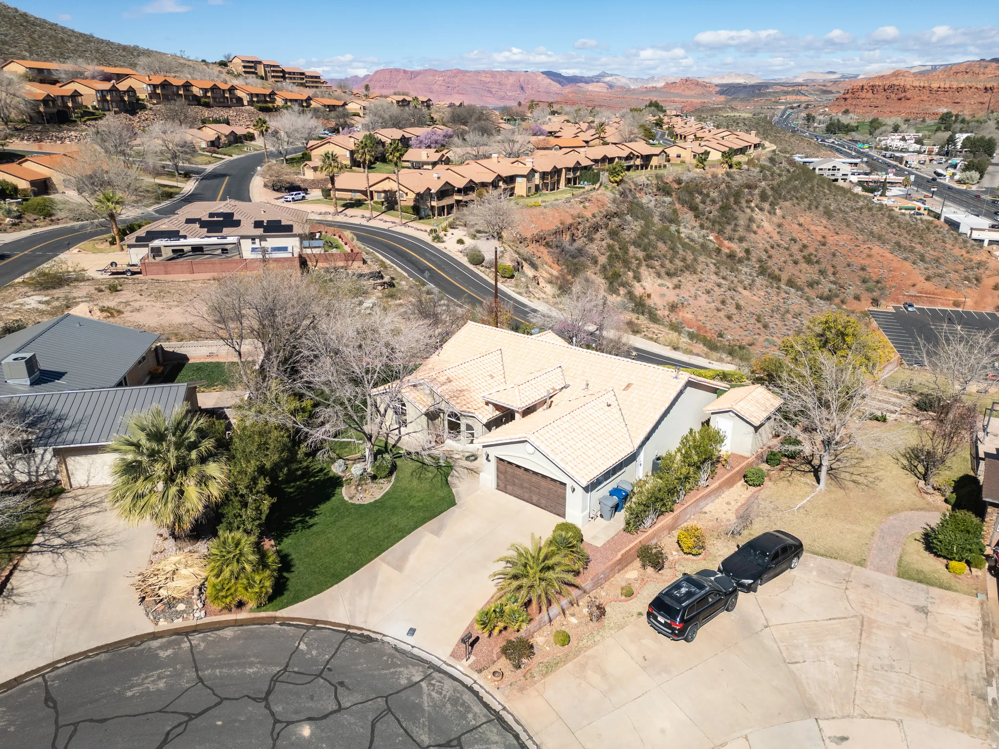 Aerial view of residential area with mountains