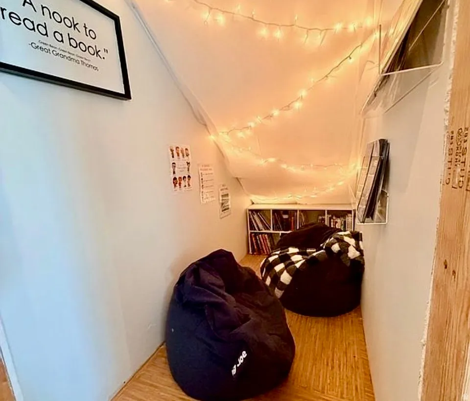 Hall with light wood-style flooring