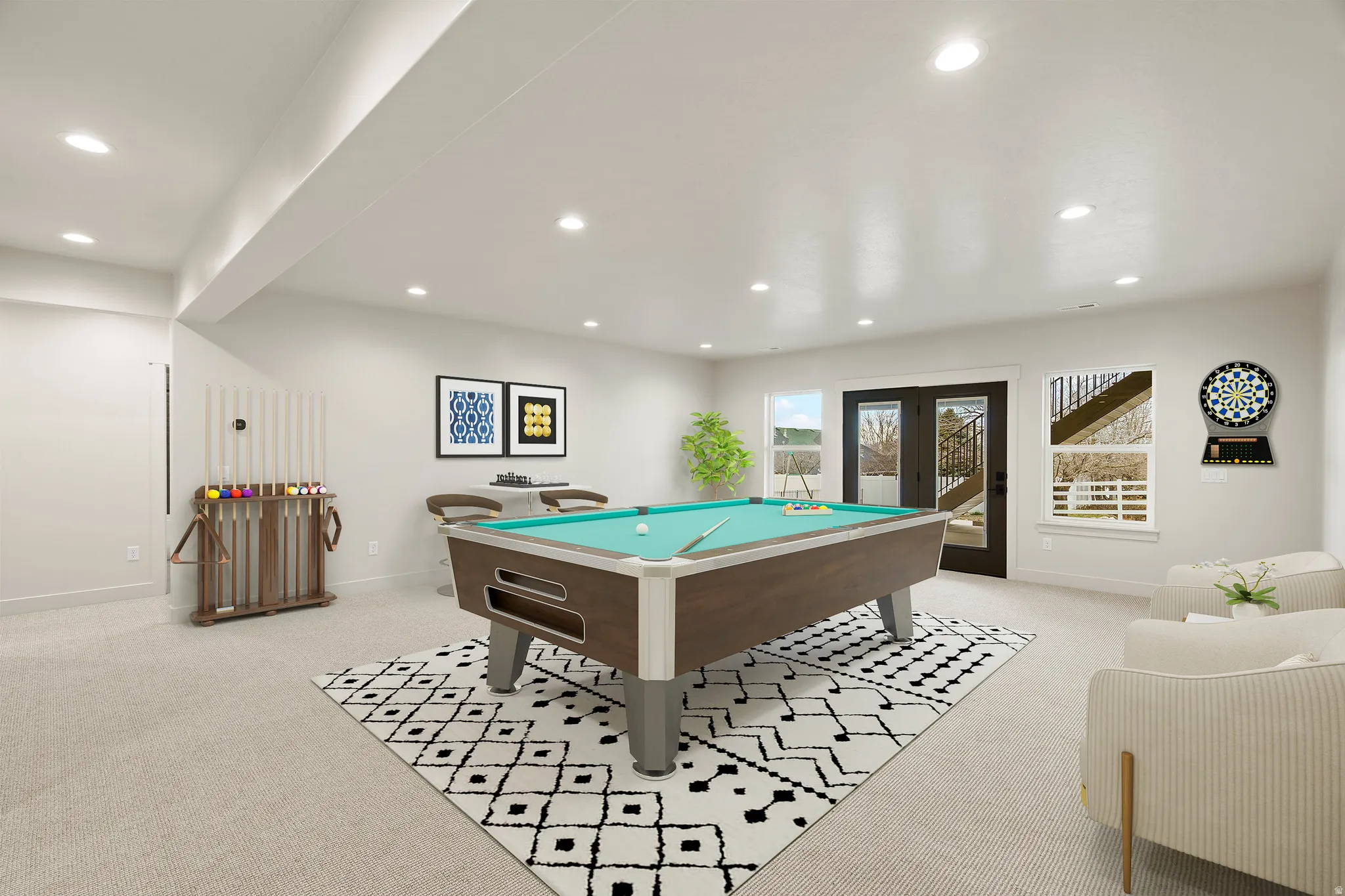 Spacious recreational room with recessed lighting, light carpeting, and white walls