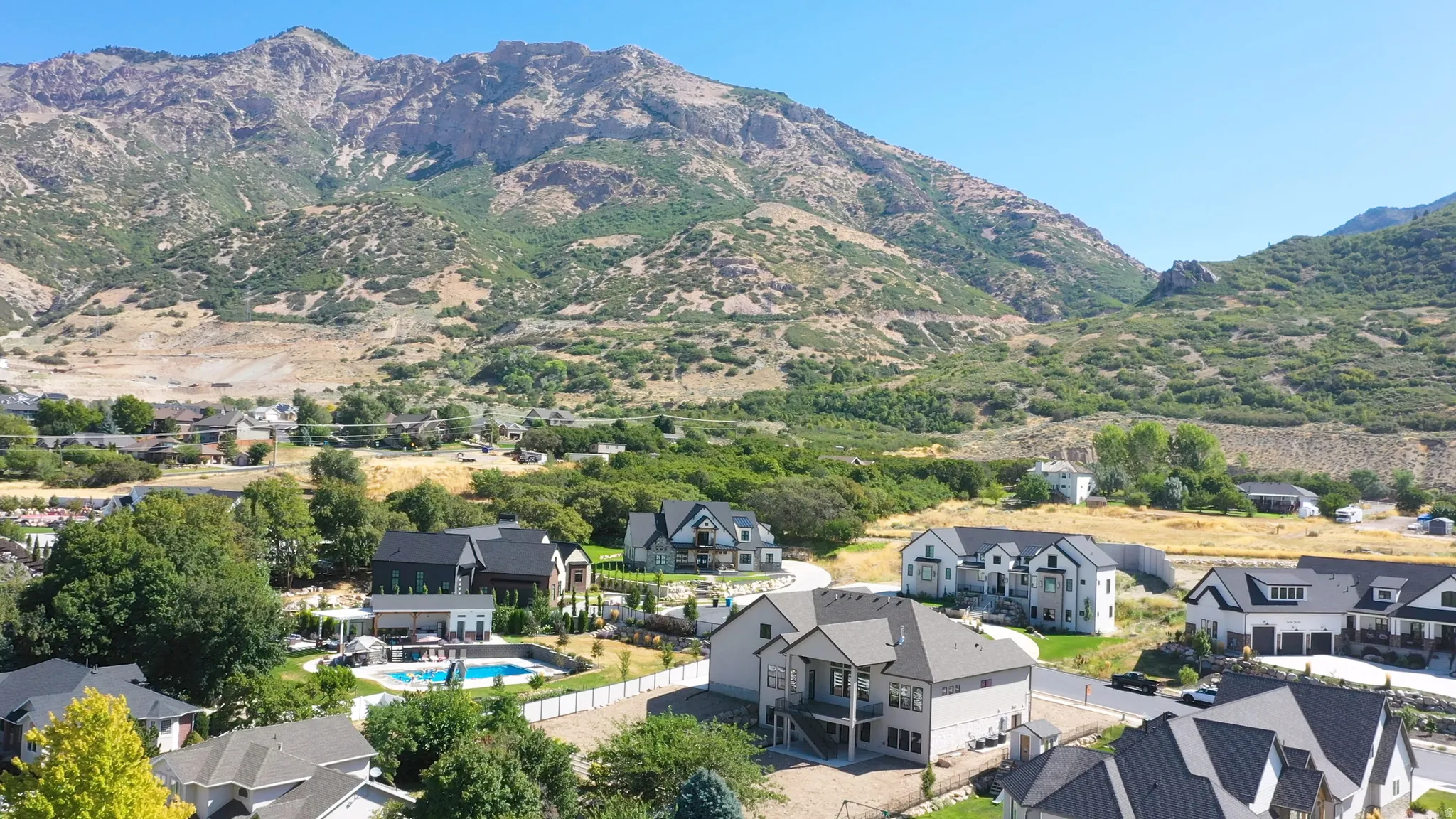 Mountain backdrop with residential properties