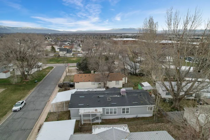 Aerial perspective of suburban area featuring mountains