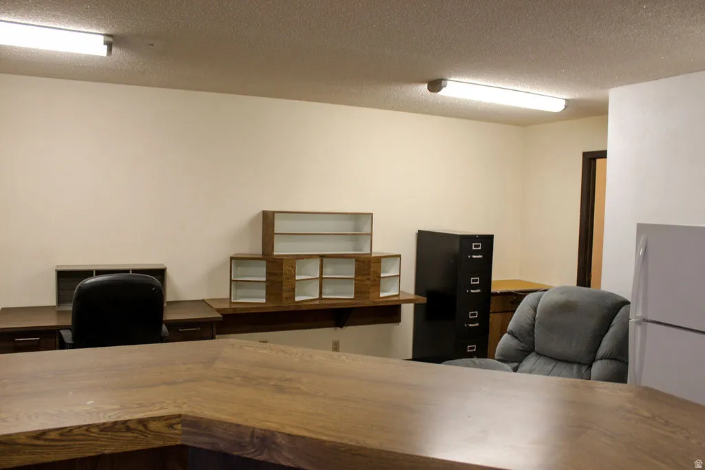 Office space with a textured ceiling
