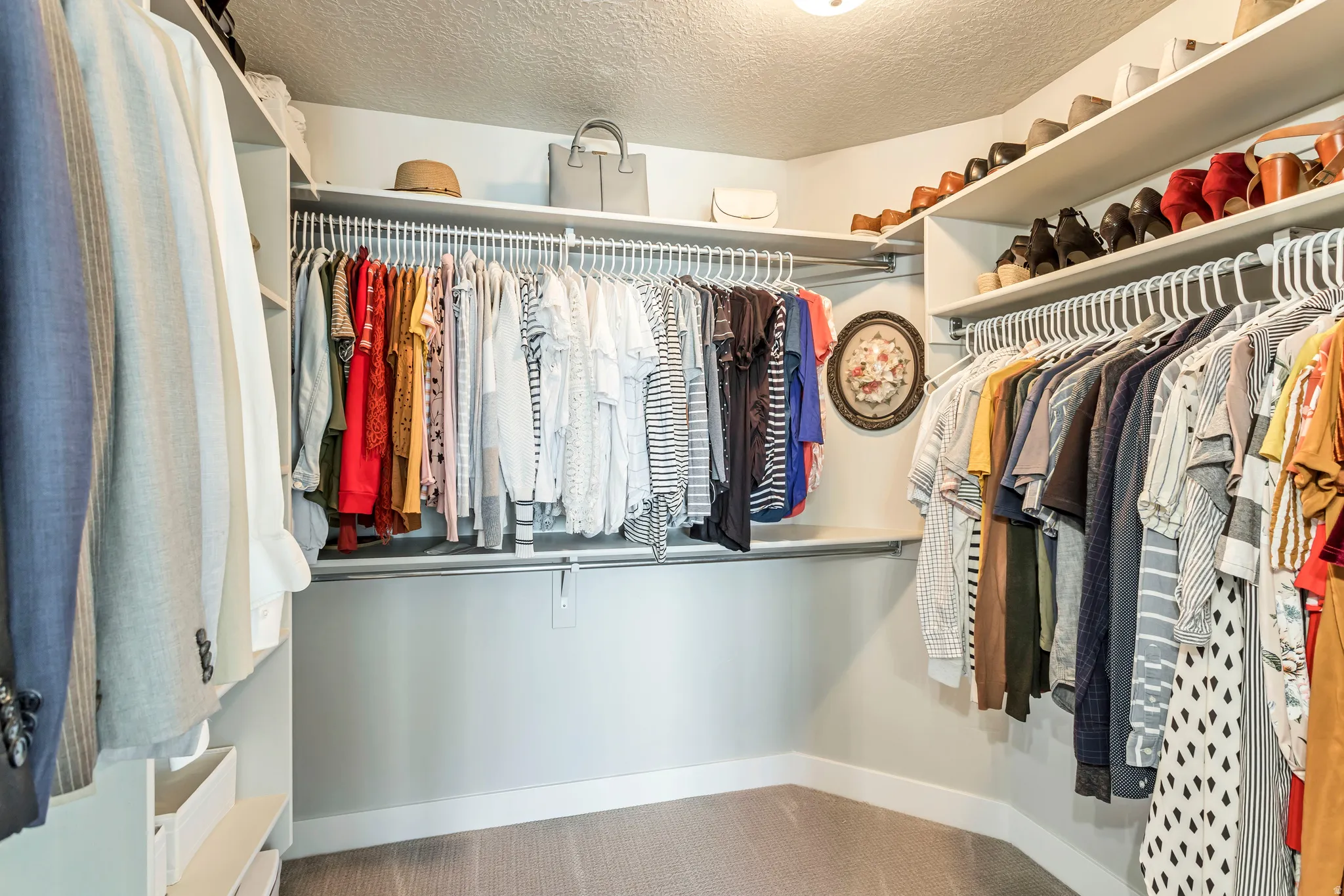 Walk in closet featuring carpet