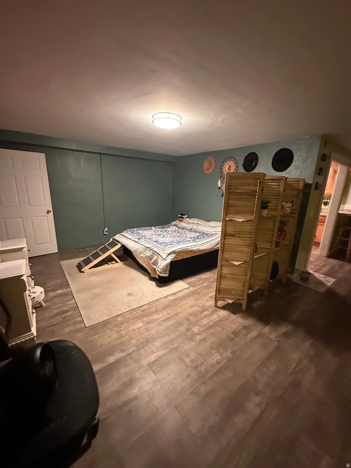 Bedroom featuring dark wood finished floors