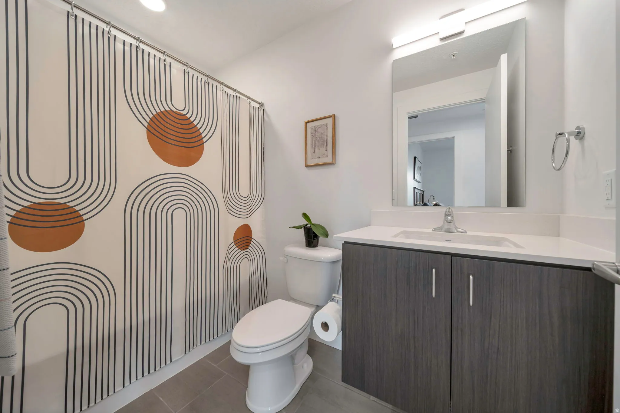 Full bathroom with vanity and a shower