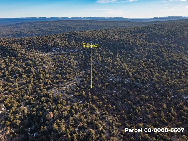 Drone / aerial view of a mountainous background
