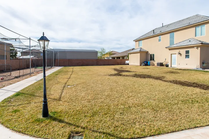 View of fenced backyard