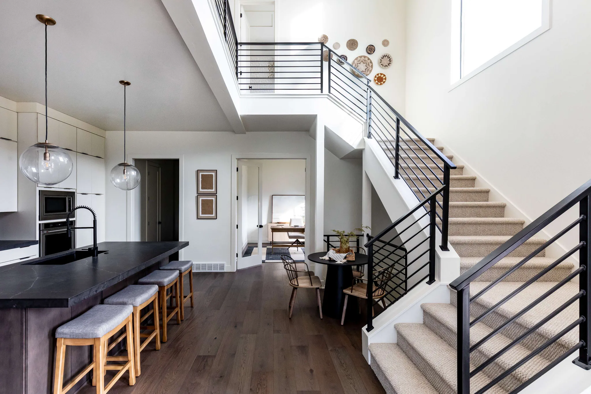 Foyer with a high ceiling and dark wood-type flooring