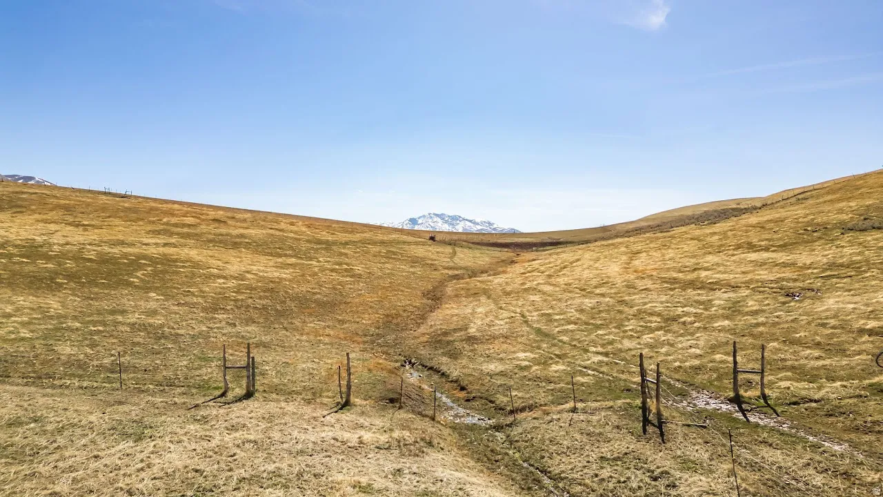 View of property with a mountain view.