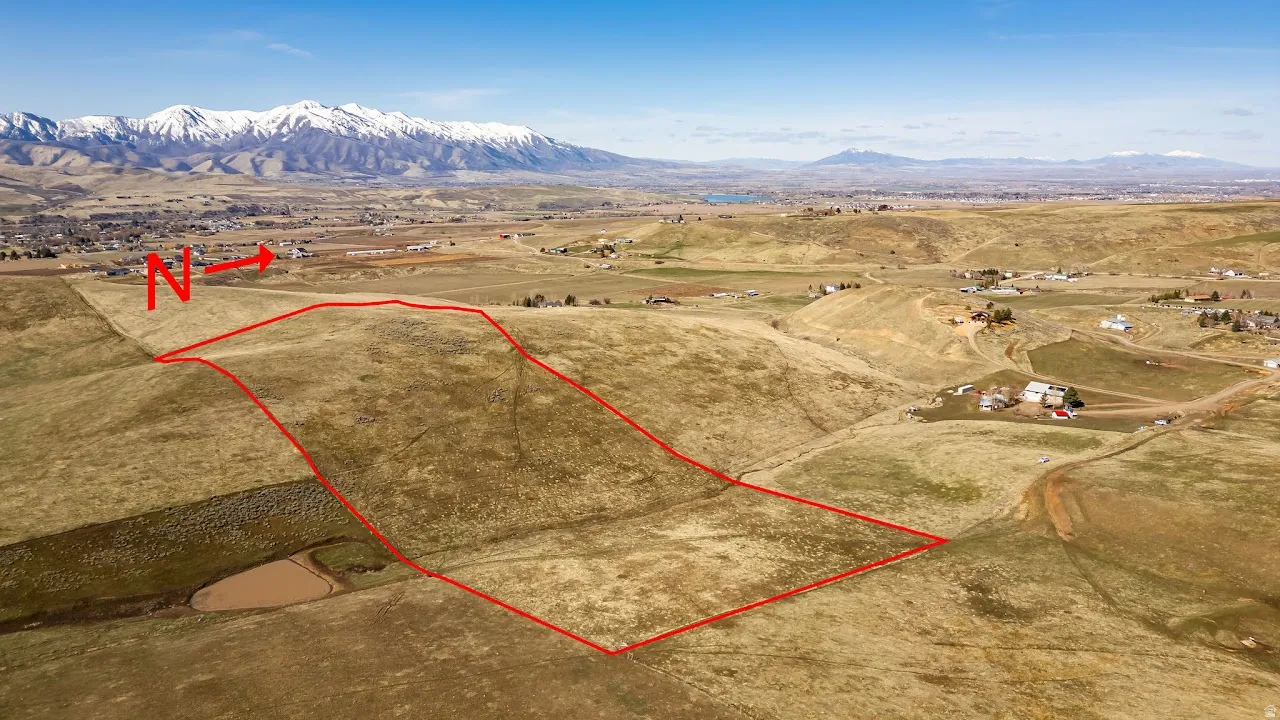View of rural area with property parcel outlined and mountains