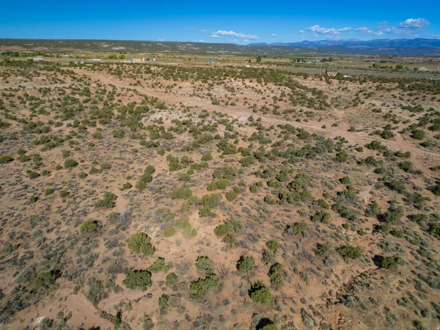 View of rural area featuring a desert landscape and mountains