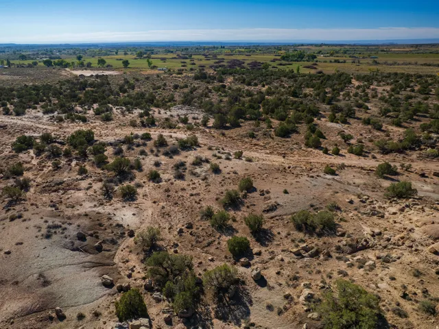 Aerial view of sparsely populated area featuring a desert landscape