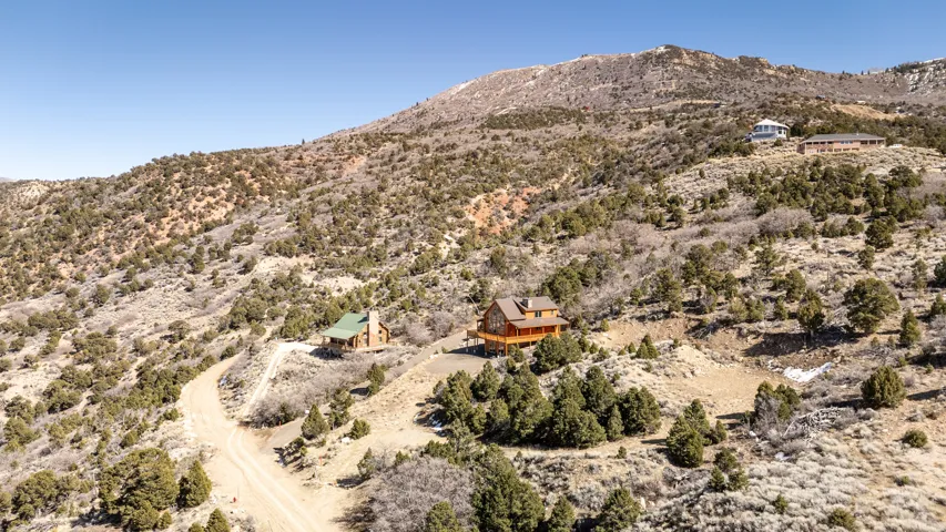 View of mountain backdrop featuring rural landscape and a desert landscape