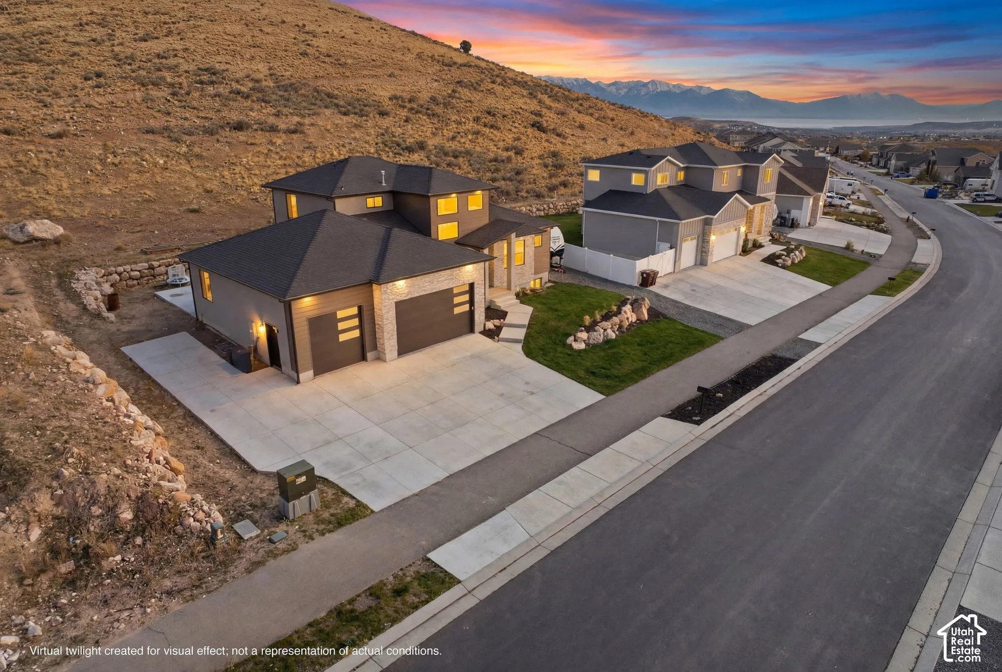 Stunning view of the lake; property features extra concrete for plenty of parking