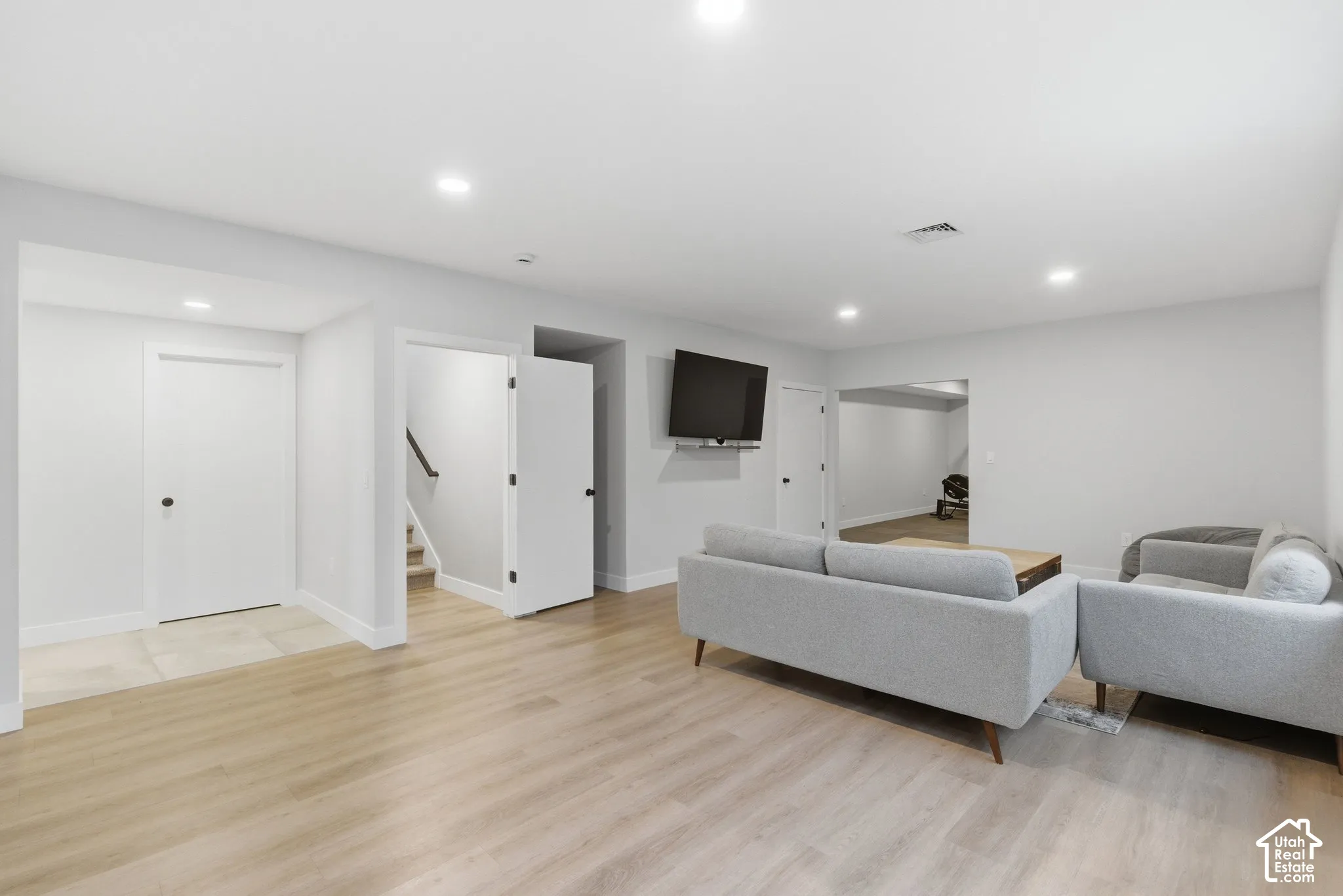 Basement features 9-foot ceilings and luxury vinyl plank flooring.
