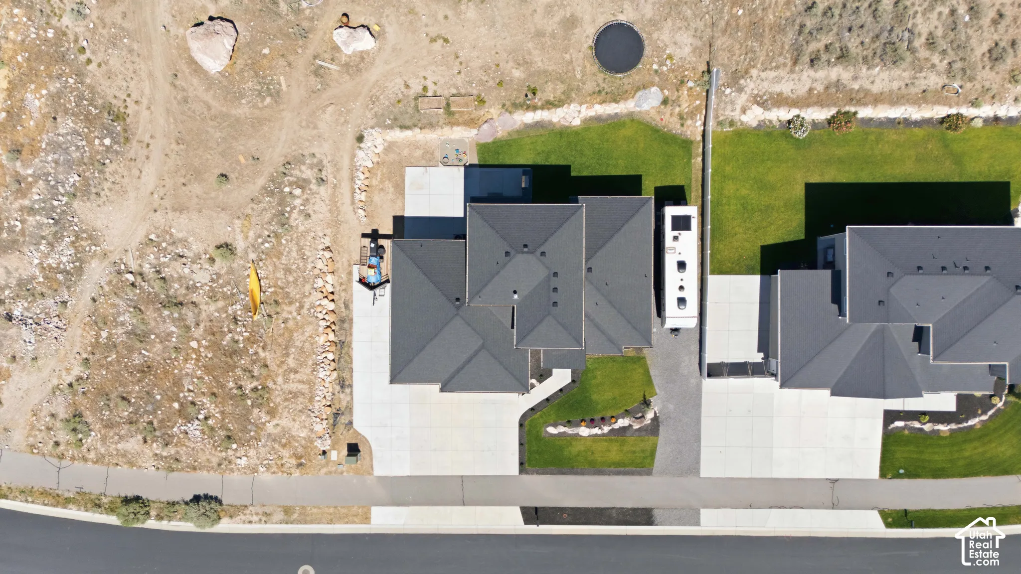 Ample parking for RVs and more bordering both sides of the home