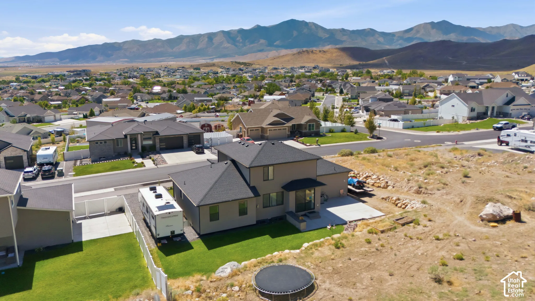 Private backyard with flat, usable lawn and versatile terrain ideal for livestock, a pool, garden boxes, and more. No backyard neighbors ever!