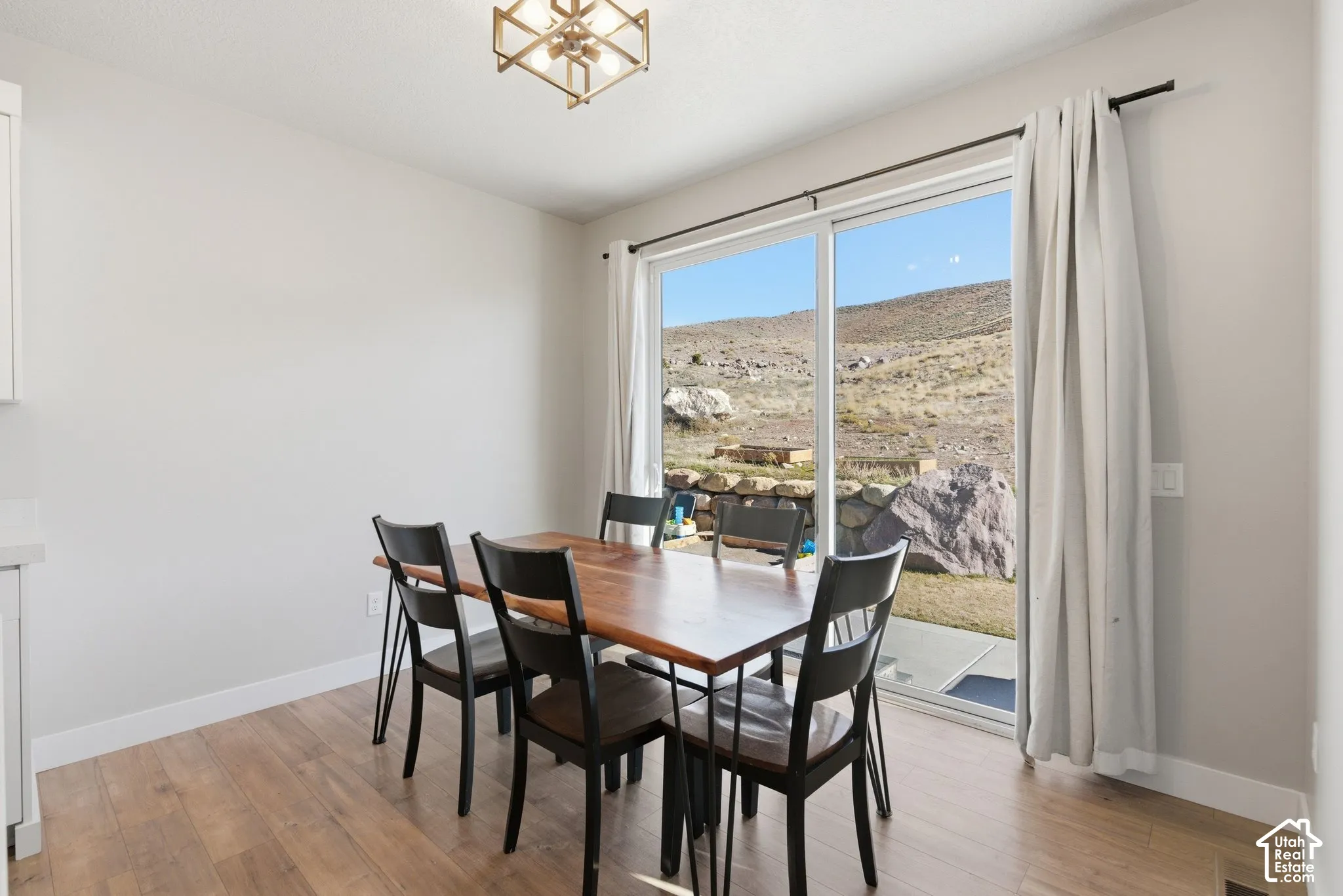 Very spacious dining area overlooking the private hillside backyard with frequent wildlife views, including deer and birds.