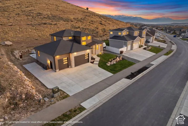 Stunning view of the lake; property features extra concrete for plenty of parking