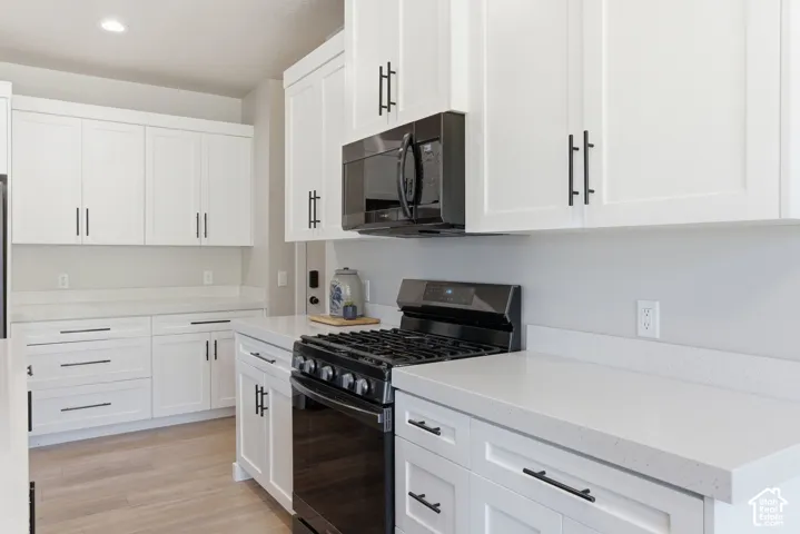Abundance of soft close cabinetry and countertop space