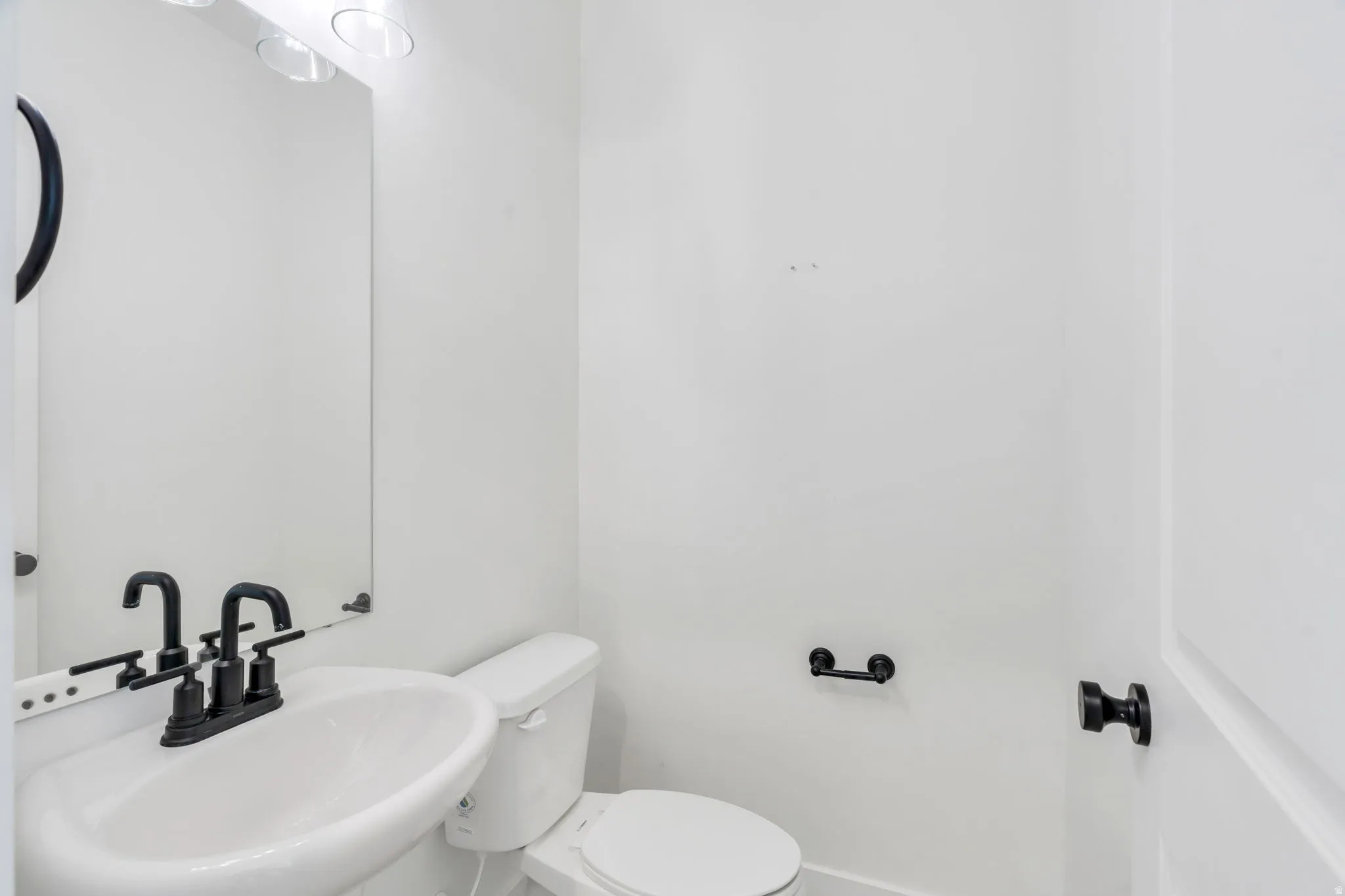 Bathroom with toilet and a sink