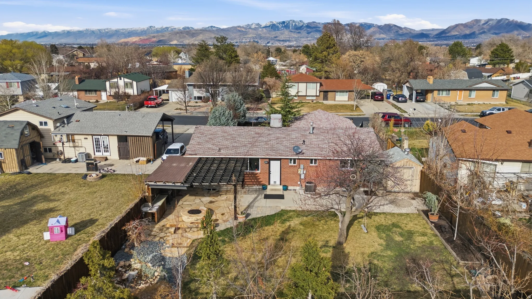 Aerial view of residential area with mountains