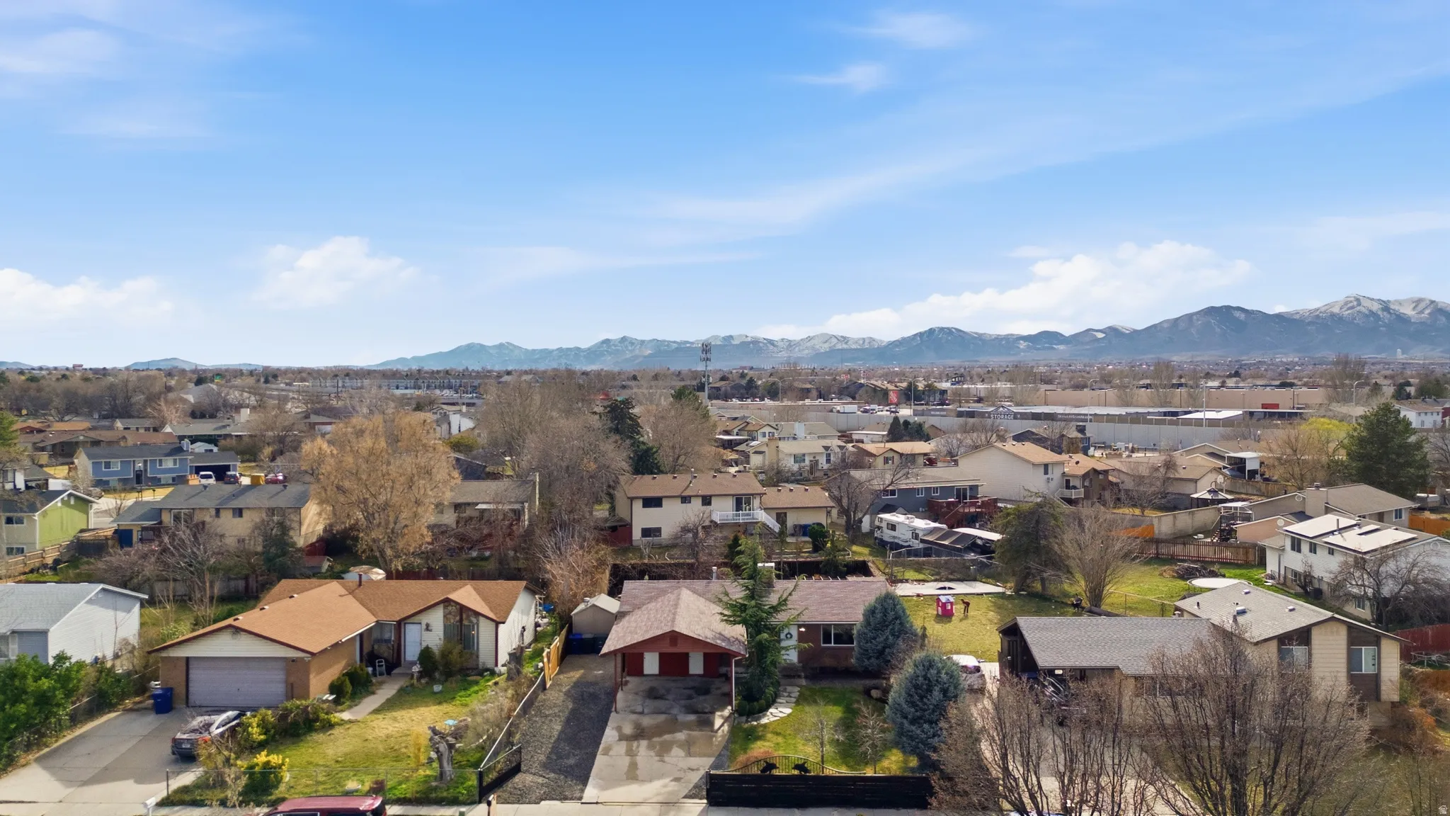 Aerial view of residential area with mountains
