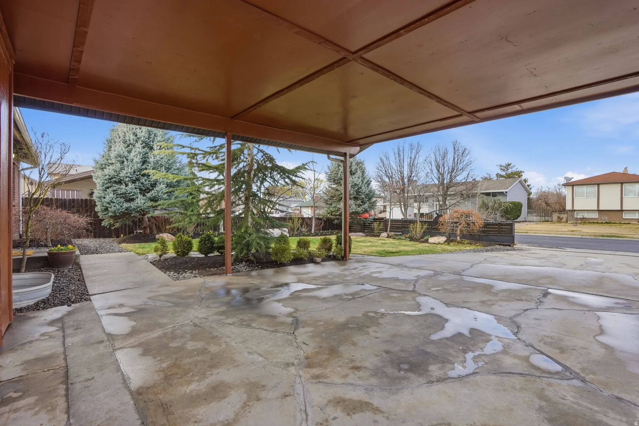Fenced backyard featuring a patio area