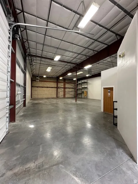 Garage featuring a heating unit